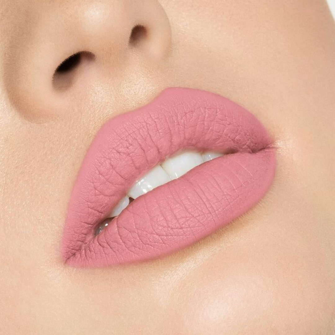 Beautiful light pink liquid lipstick matte but not drying better than huda beauty